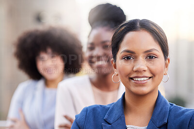 Buy stock photo Shot of a diverse group of businesswomen standing together on the balcony outside
