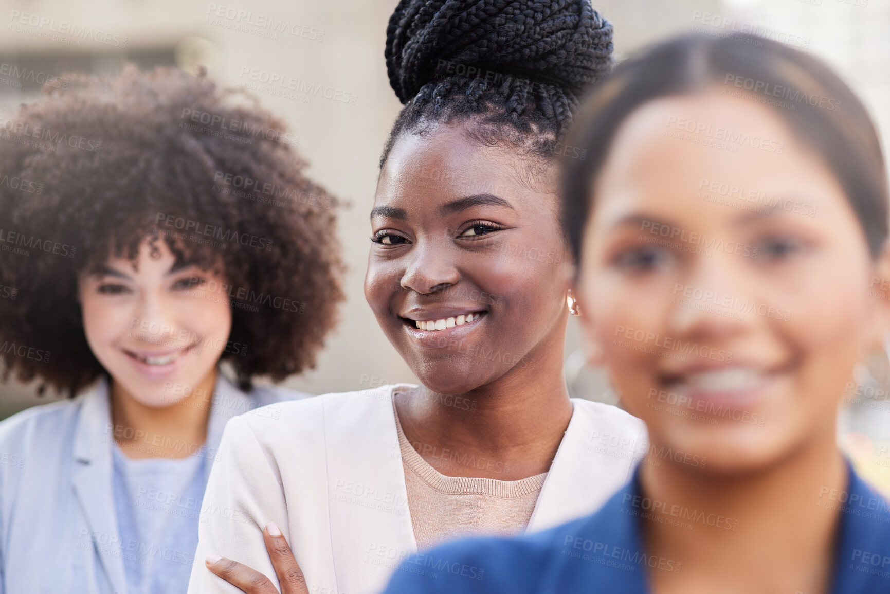 Buy stock photo Shot of a diverse group of businesswomen standing together on the balcony outside