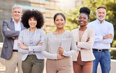 Buy stock photo Shot of a diverse group of businesspeople standing together on the balcony outside