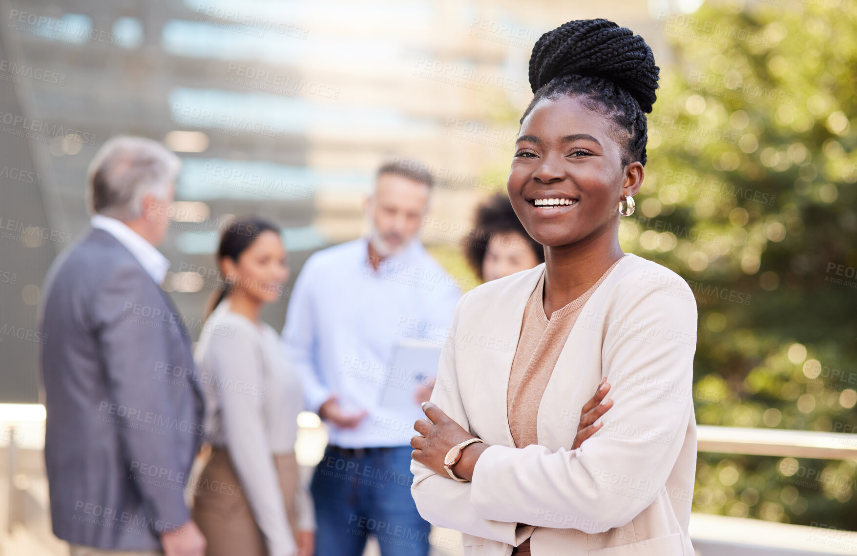Buy stock photo Business people, portrait and happy woman on balcony with arms crossed, pride and career. Leader, city and person with confidence for about us, company growth and corporate outdoor with team