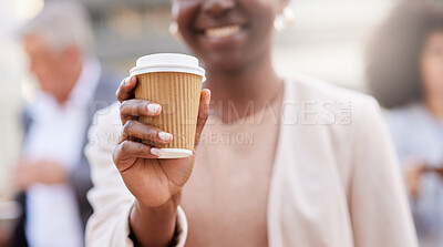 Buy stock photo Cropped shot of an unrecognisable businesswoman standing outside and holding a cup of coffee