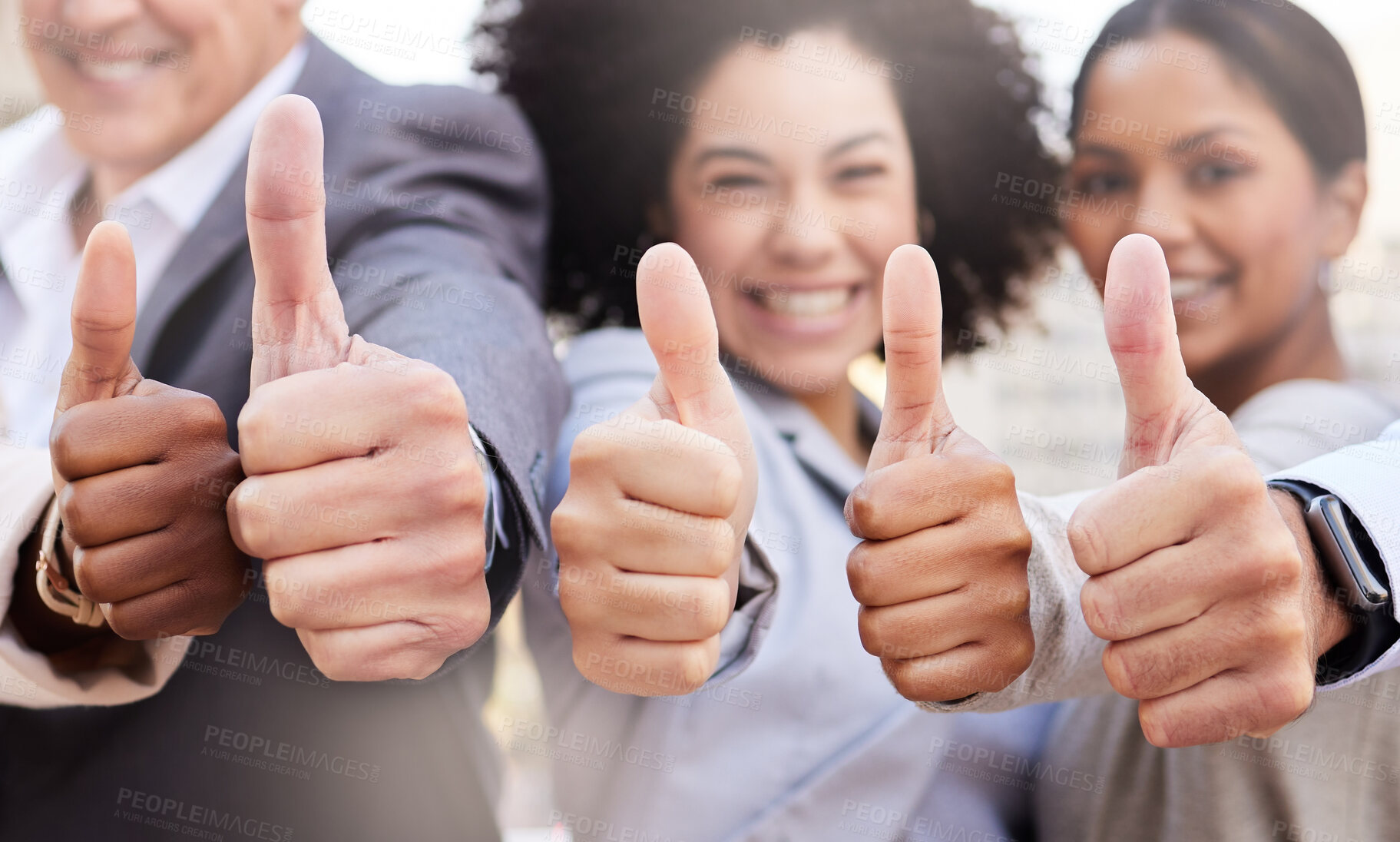 Buy stock photo Shot of a diverse group of businesspeople standing outside on the balcony together and showing a thumbs up