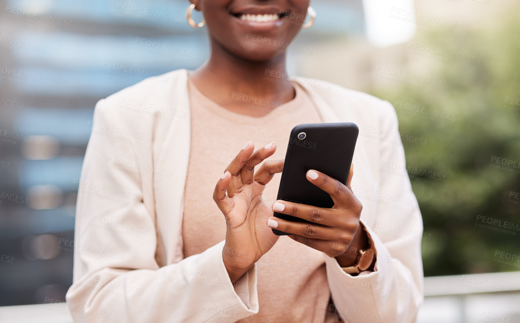 Buy stock photo Cropped shot of an unrecognisable businesswoman standing alone on the balcony outside and using her cellphone