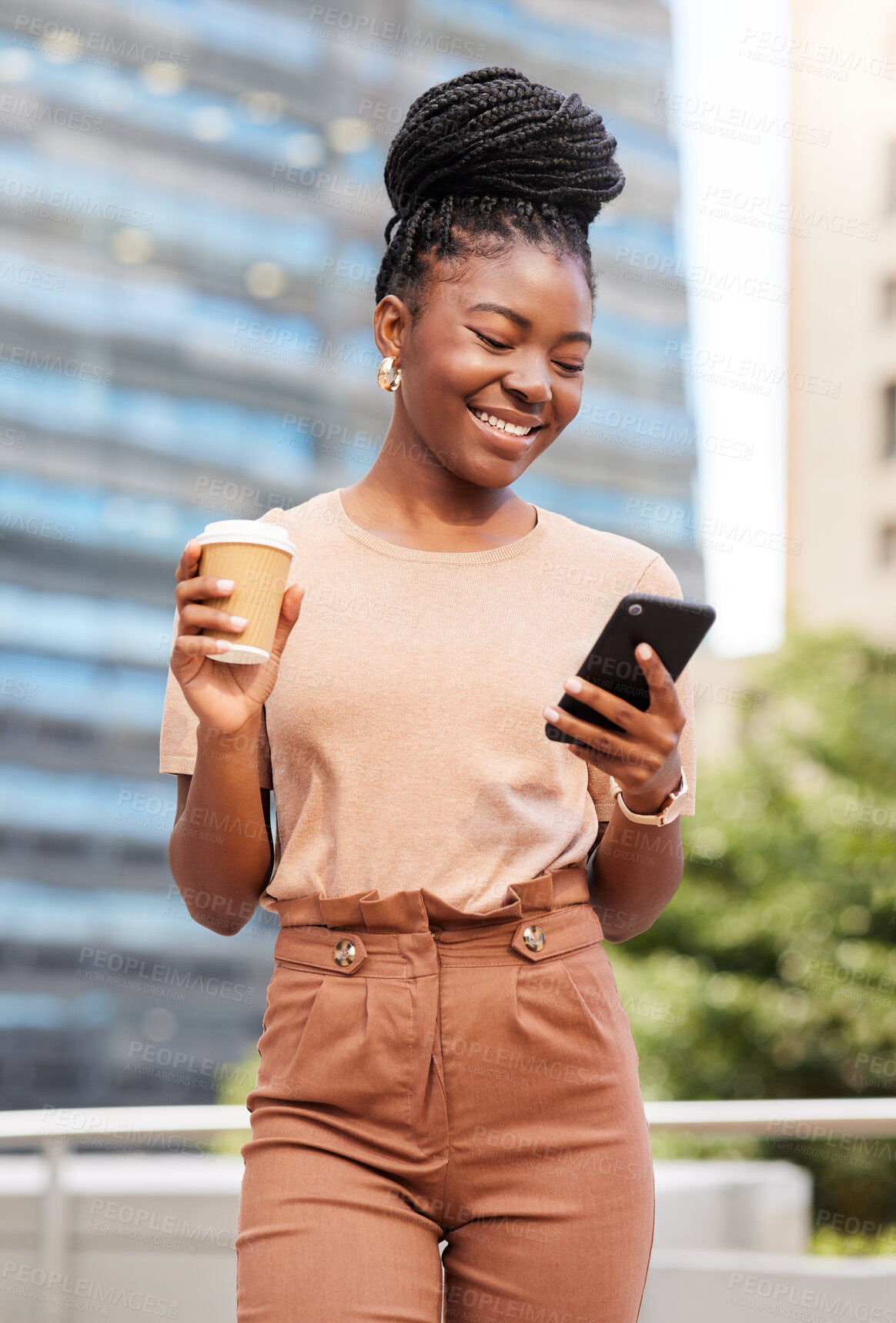 Buy stock photo Shot of a young businesswoman standing on the balcony outside and using her cellphone while holding a cup of coffee