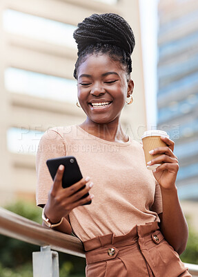 Buy stock photo Shot of a young businesswoman standing on the balcony outside and using her cellphone while holding a cup of coffee
