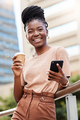 Buy stock photo Shot of a young businesswoman standing on the balcony outside and using her cellphone while holding a cup of coffee