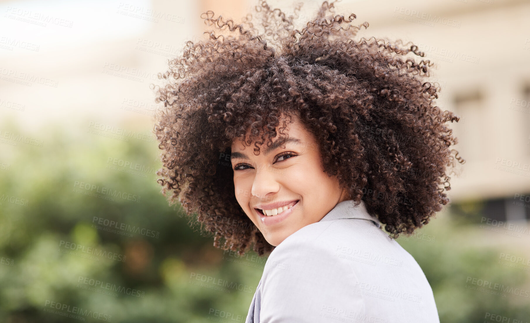 Buy stock photo Shot of an attractive young businesswoman standing alone outside on the balcony