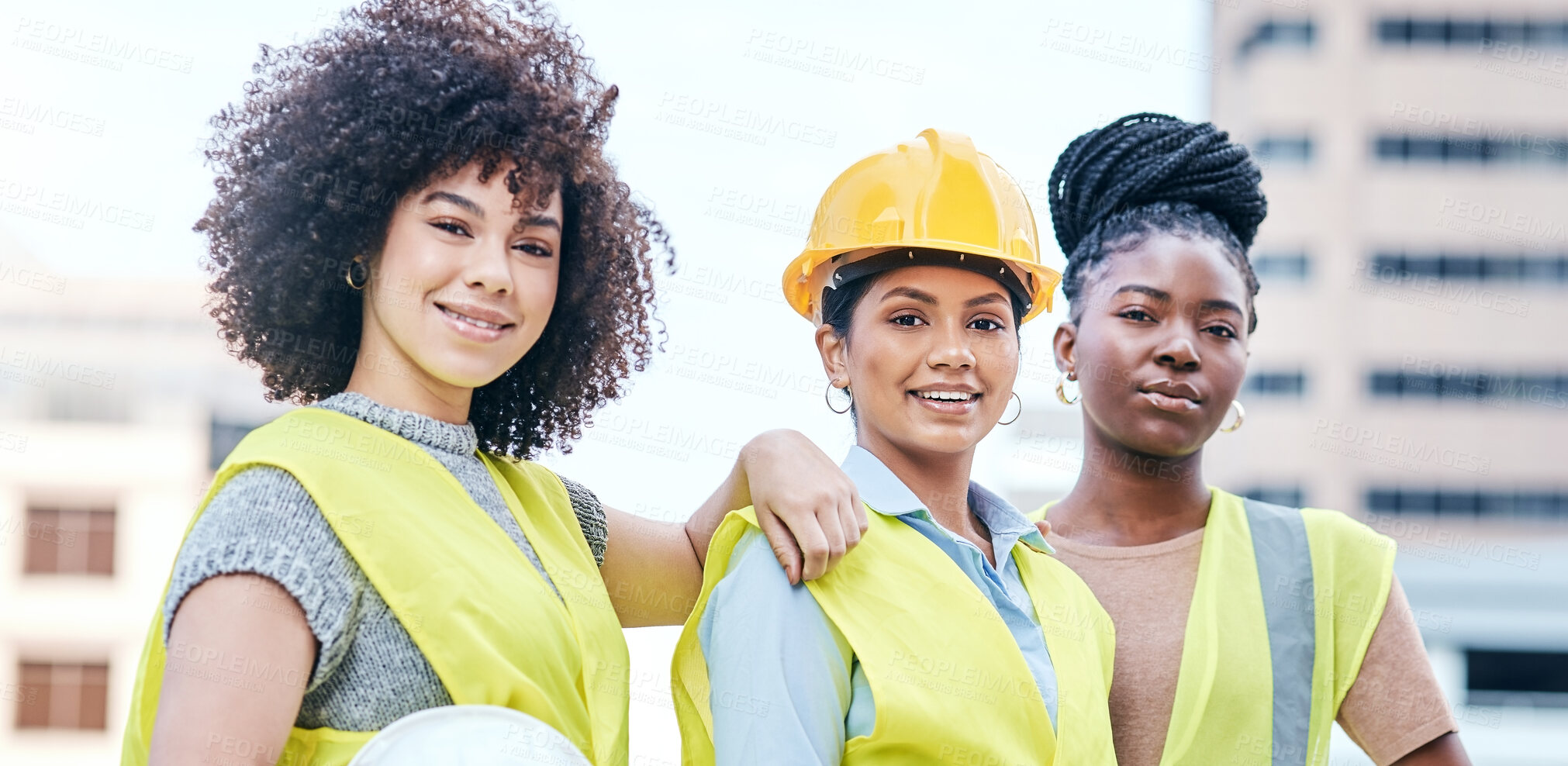 Buy stock photo Portrait of a group of confident young businesswomen working at a construction site