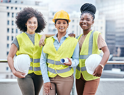 Buy stock photo Portrait of a group of confident young businesswomen working at a construction site