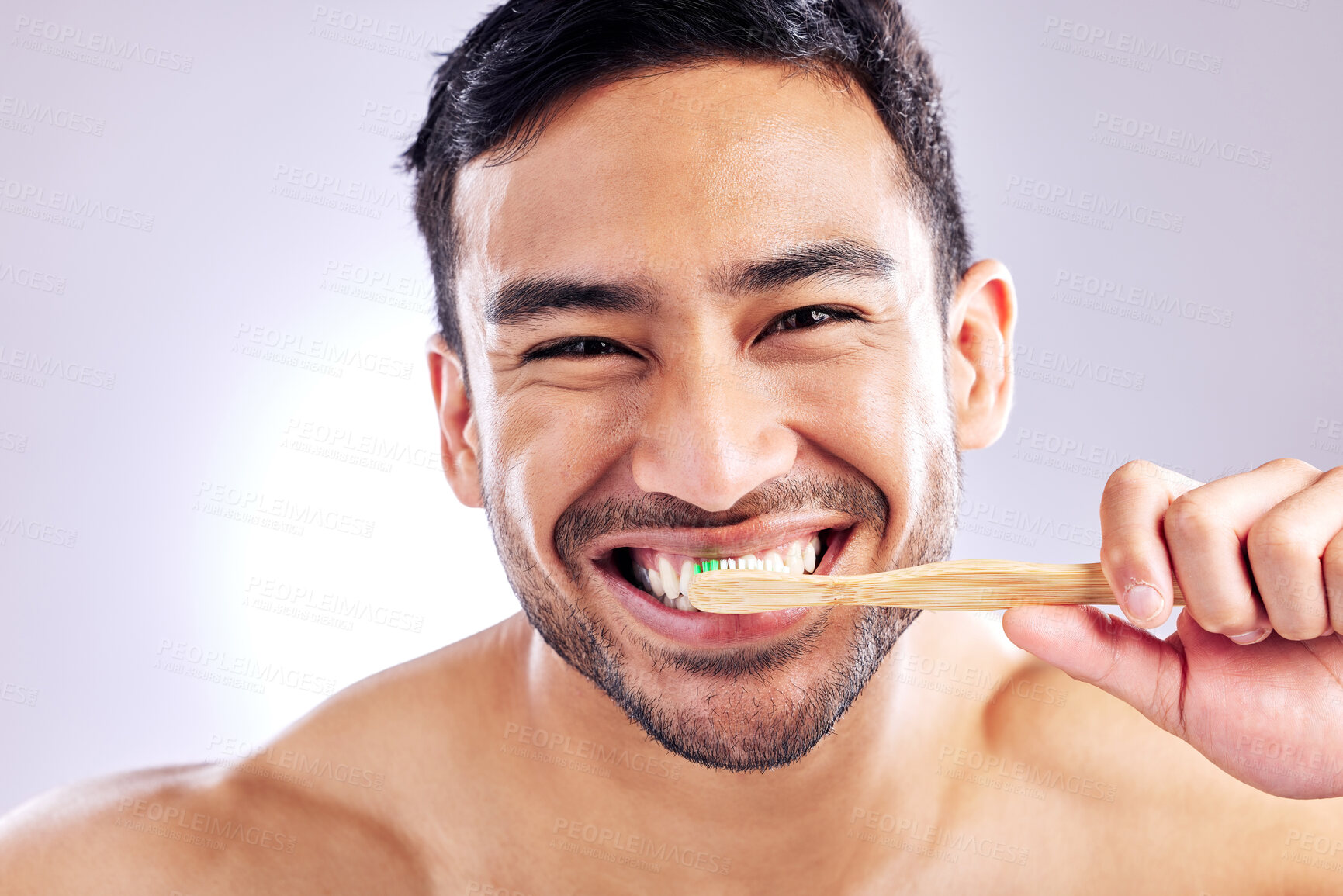 Buy stock photo Grooming, portrait and man with toothbrush for teeth, wash and routine of hygiene in morning and dental. Oral health, wellness and person with smile in white background, studio and cleaning of tooth