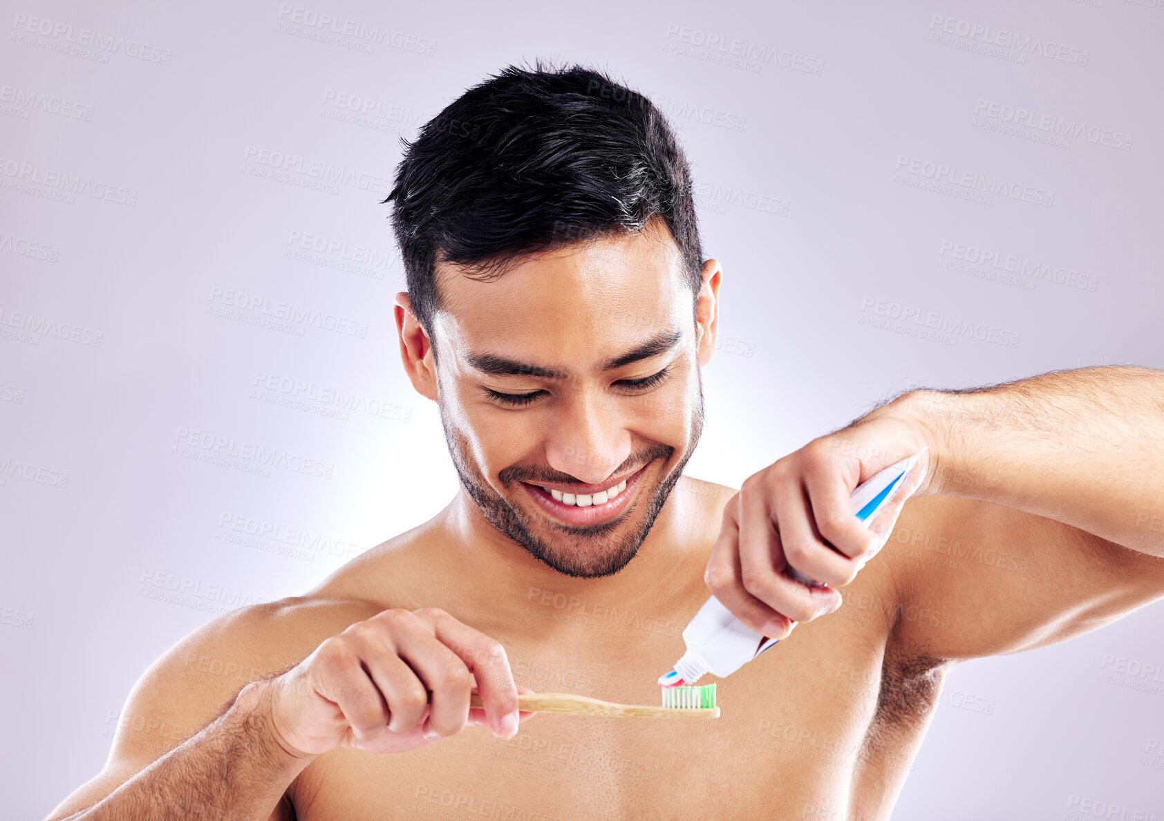 Buy stock photo Man, smile with toothpaste and studio on white background for dental hygiene, cleanliness and wellness. Male person, happy or confident with toothbrush for mouth, freshness and health or whitening