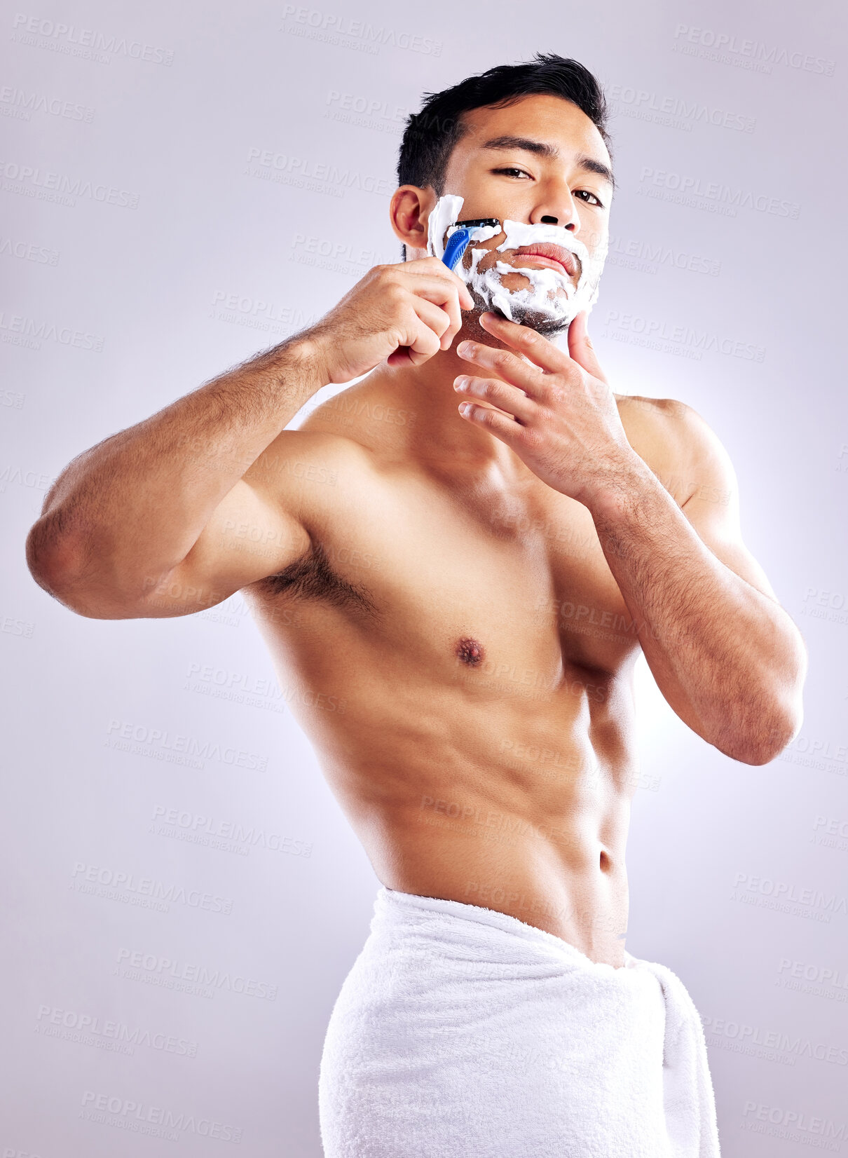 Buy stock photo Razor, portrait and man shaving face for skincare, health and hair removal for hygiene isolated on white studio background. Cream, beard and trim for cleaning, beauty and body muscle for grooming