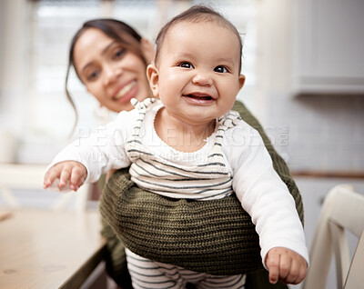 Buy stock photo Shot of an adorable baby bonding with his mother at home