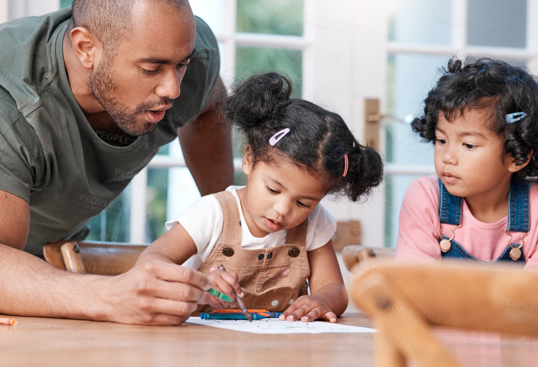 Buy stock photo Father, children and drawing in home with family, creative skills or bonding together on weekend break. Dad, girl kids and help at table with art stationery, crayon or color for learning development.