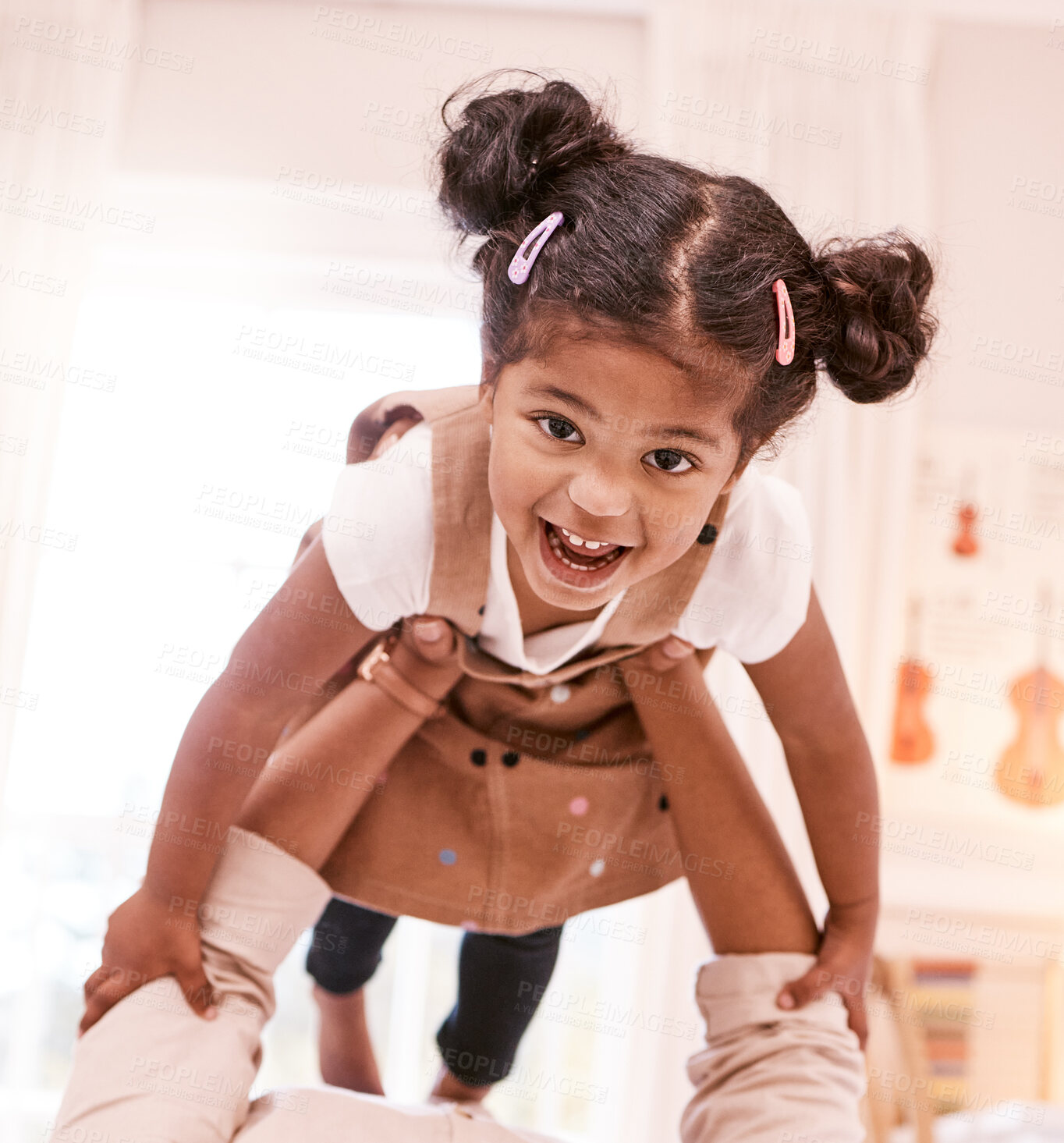 Buy stock photo Shot of a little girl playing with her mother at home