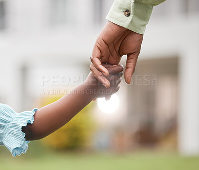 Buy stock photo Closeup shot of an unrecognisable mother and daughter holding hands together outdoors