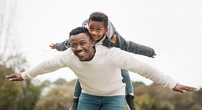 Buy stock photo Portrait of a father and his son having fun while bonding together outdoors