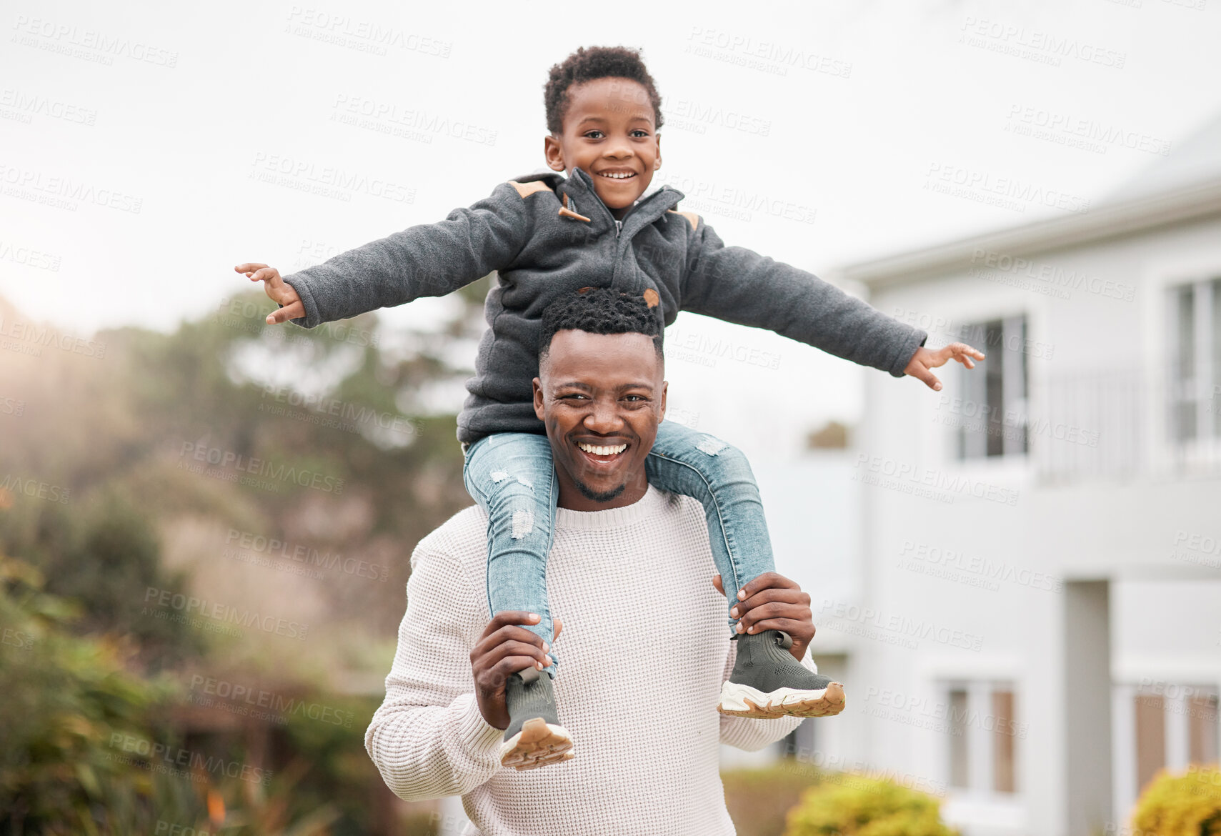 Buy stock photo Portrait of a father and his son having fun while bonding together outdoors