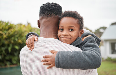 Buy stock photo Portrait of an adorable little boy being carried by his father while bonding together outdoors