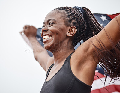 Buy stock photo Shot of a young female athlete holding a flag