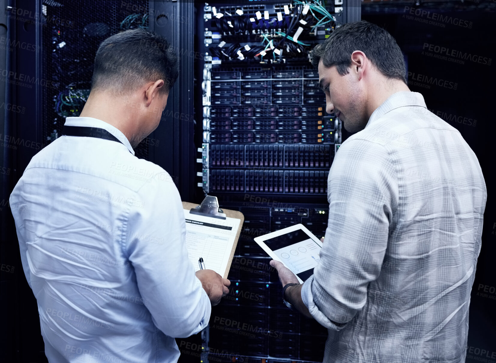 Buy stock photo Back, data center and people with tablet, computer engineer and checklist for collaboration or teamwork. Technician, analysis and hardware in server room for system update, maintenance or it security