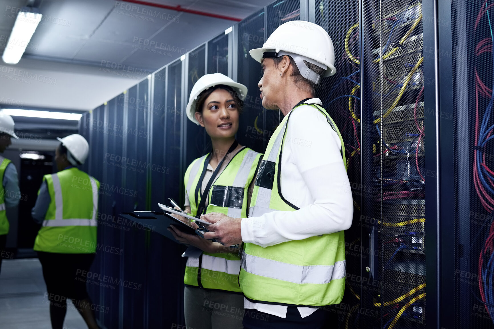 Buy stock photo Data center, women and tablet with clipboard, safety and programmer in computer engineering. Female people, inspection and tech for hardware, security and server room for system update or maintenance