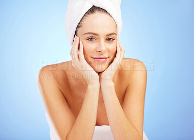 Buy stock photo Woman, portrait and clean skincare in studio, beauty and morning routine on blue background. Female person, cosmetics and after shower wellness for hygiene, facial treatment and pride for dermatology