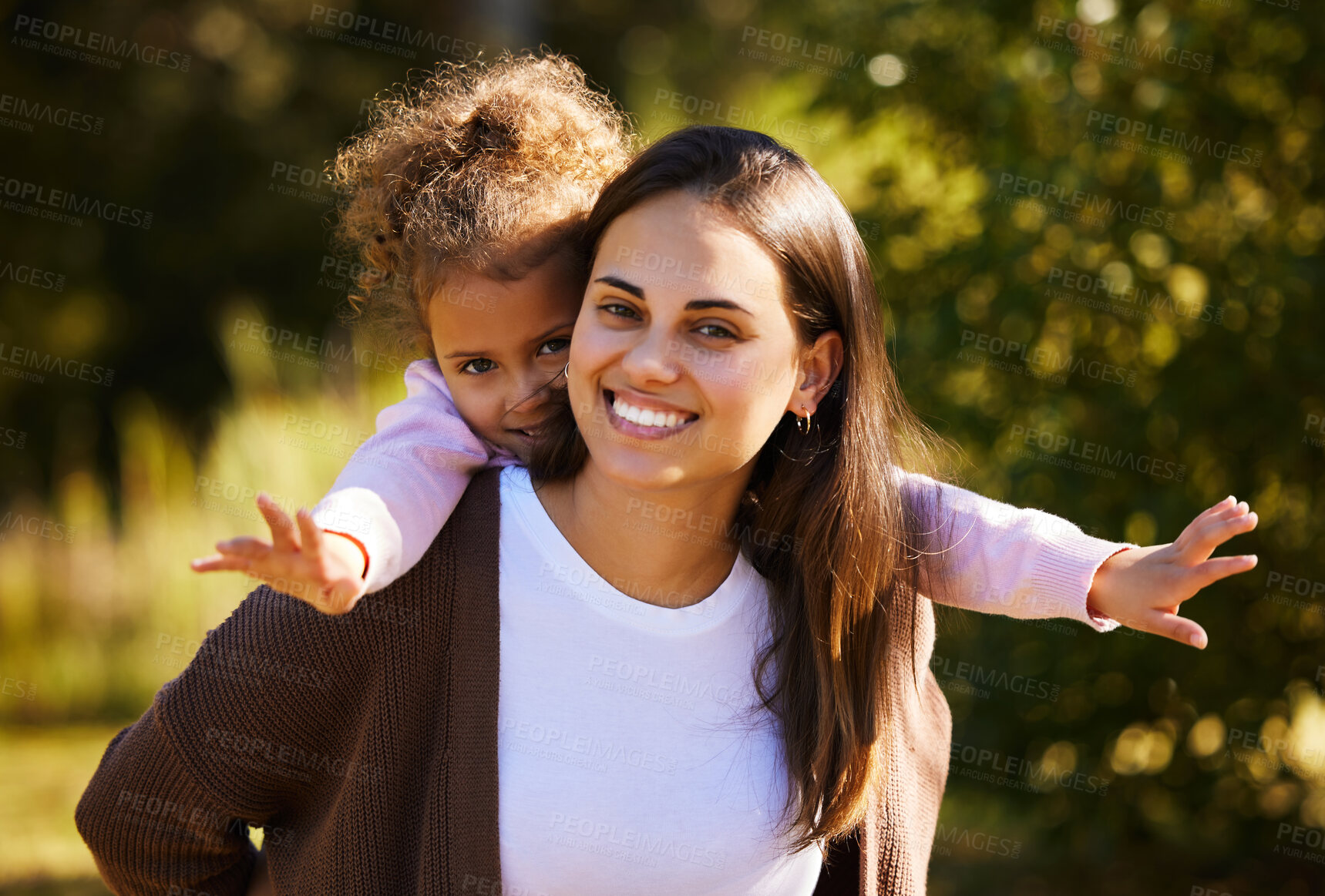 Buy stock photo Mother, child and piggyback portrait in park, love and bonding to connect in childhood at garden. Mama, carrying daughter and adventure game for fantasy in outdoor, happiness and care in nature