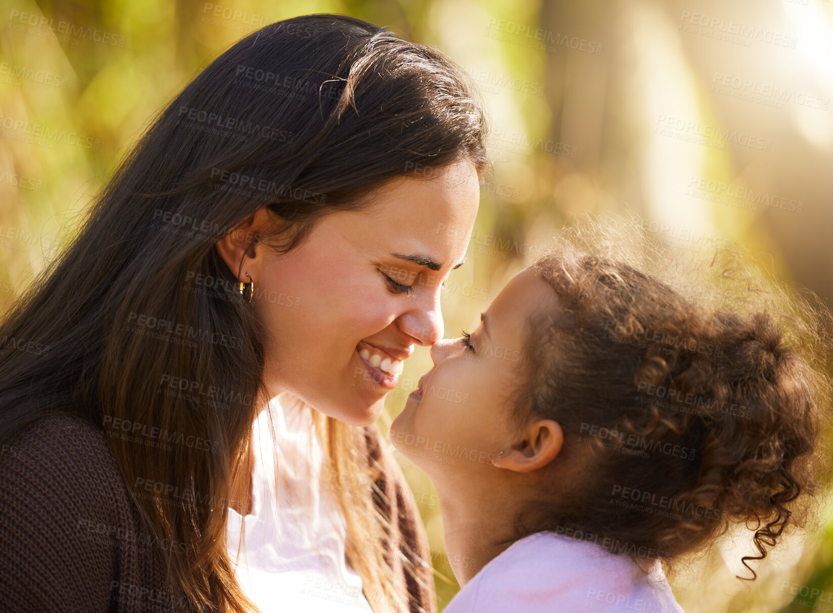 Buy stock photo Mother, child and nose touch in park, love and bonding to connect in childhood at garden. Mama, daughter and playing game for support in outdoor profile, happiness and affection or care in nature