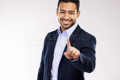 Buy stock photo Studio shot of a young businessman connecting to a user interface against a white background