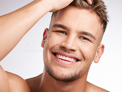 Buy stock photo Skincare, smile and man in studio for facial treatment, grooming or morning routine on white background. Beauty, wellness and male model with confidence for body care, cosmetics or satisfaction