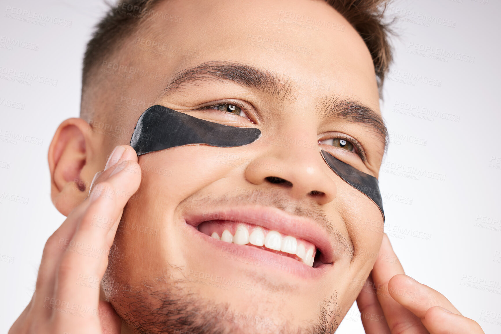 Buy stock photo Man, eye patch and skincare for beauty, skin glow and collagen cosmetics in studio. Dermatology, model eyes and male person with mask product for dark circles and spa aesthetic by white background