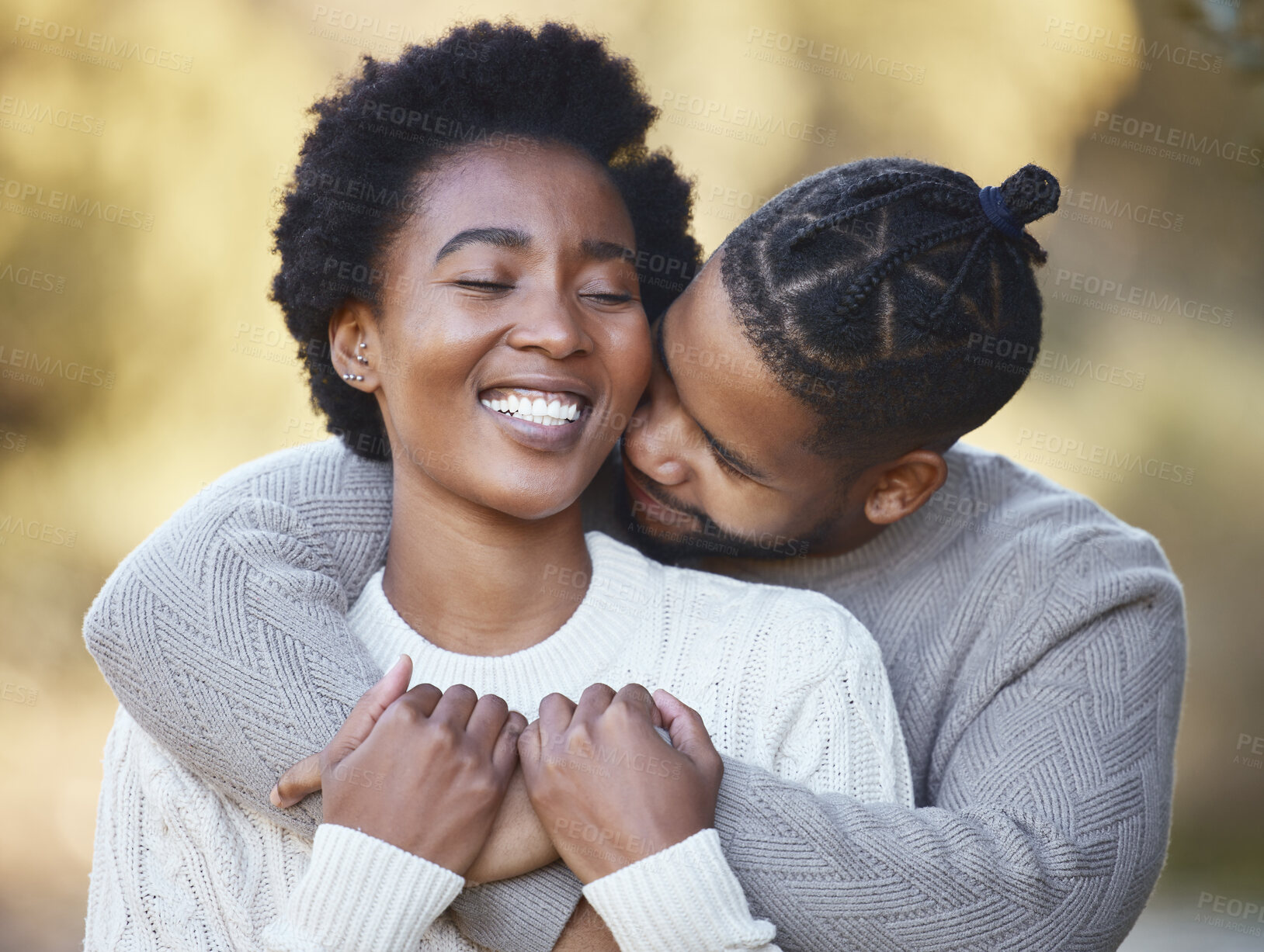 Buy stock photo Black couple, hug and happy in countryside for love, holiday and adventure or winter camping trip. Man, woman and embrace outdoor for support, comfort and together with care and smile in forest 