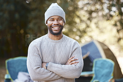 Buy stock photo Shot of a young man enjoying a camping trip