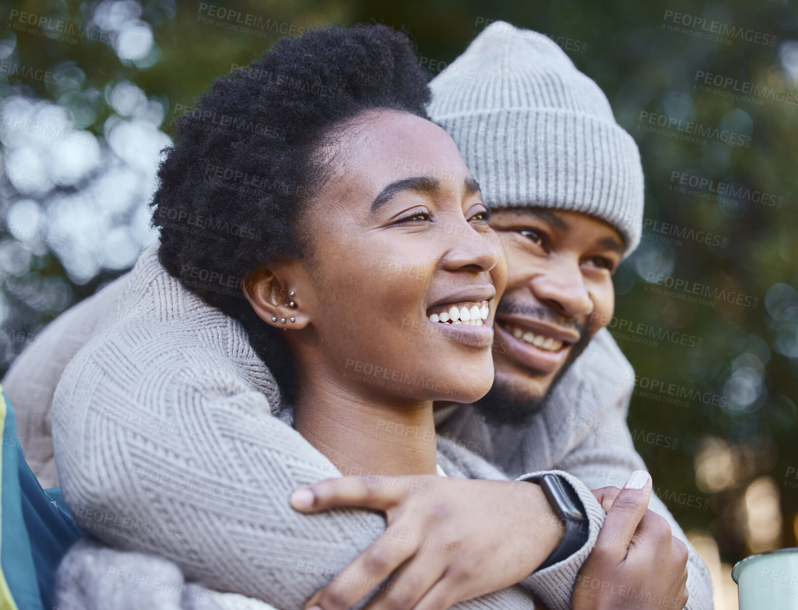 Buy stock photo Black man, woman and thinking in countryside for hug, happiness and holiday or camping trip. Smile, couple and embrace outdoor for support, comfort and together for dreaming in winter with care