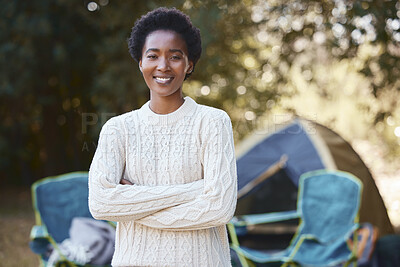 Buy stock photo Shot of a young woman enjoying a camping trip