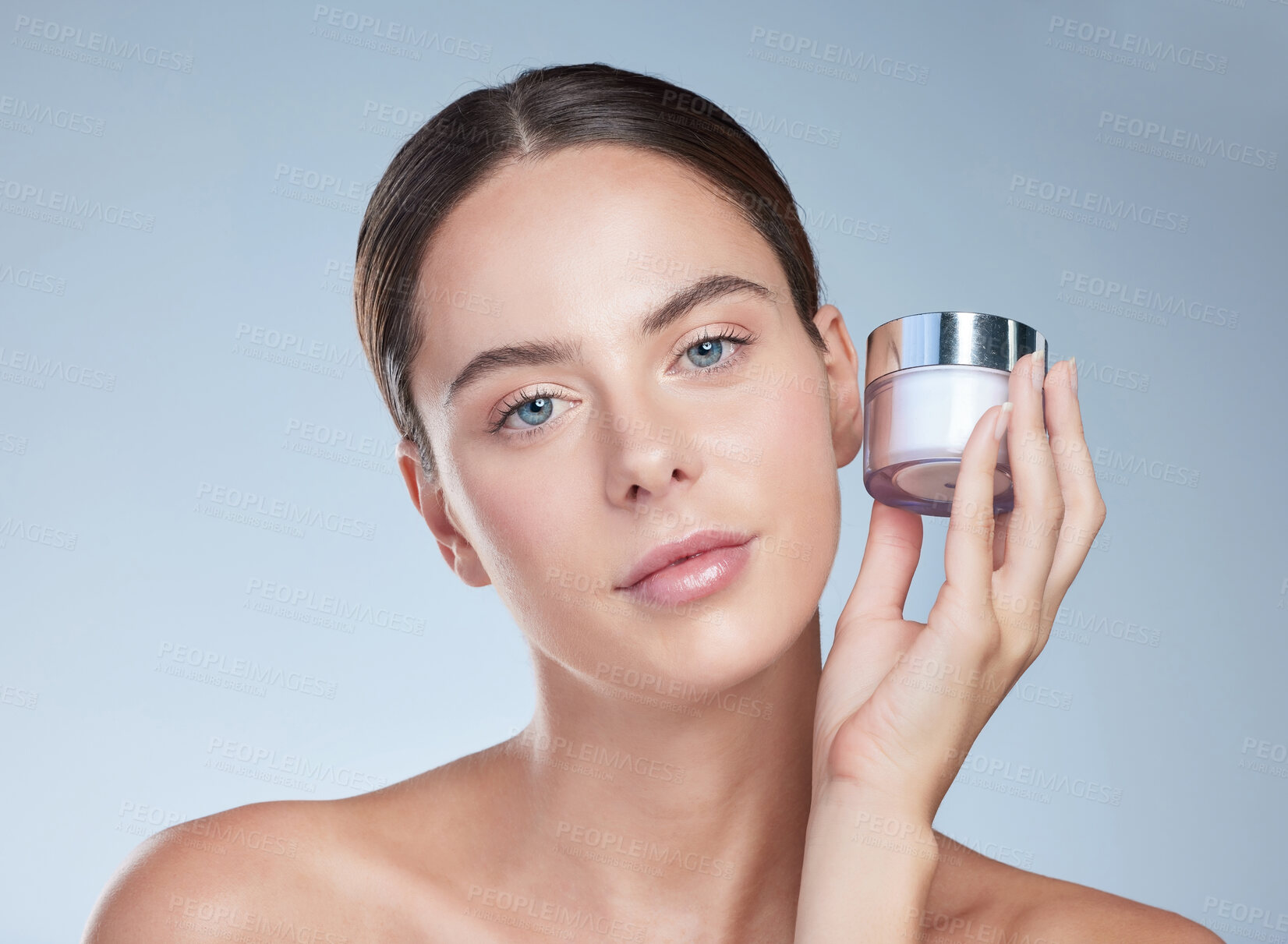 Buy stock photo Portrait, woman and cream jar for skincare with natural shine, moisture and beauty in studio. Model girl, dermatology and container for sunscreen with anti aging, collagen and glow by gray background