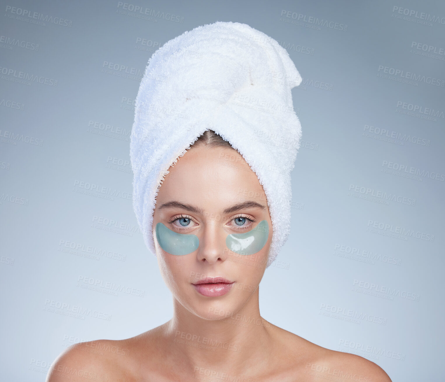 Buy stock photo Woman, eye patches and portrait for grooming in studio, facial treatment and hydration on blue background. Female person, skincare and beauty mask for moisture, vitamin e and pads for cosmetics