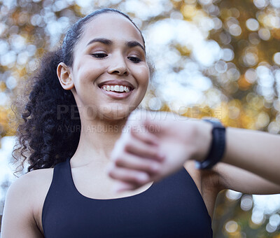 Buy stock photo Woman, progress and watch for fitness in outdoor, runner and heartbeat tracker during workout in woods. Female person, athlete and check steps for results, gps and monitor pulse or cardio stats