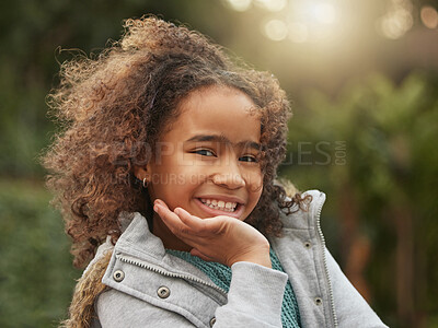 Buy stock photo Black girl, child and backyard in portrait with smile for vacation, outdoor or winter in New York City. Female person, happiness and travel in Central Park with freedom for youth, holiday for relax