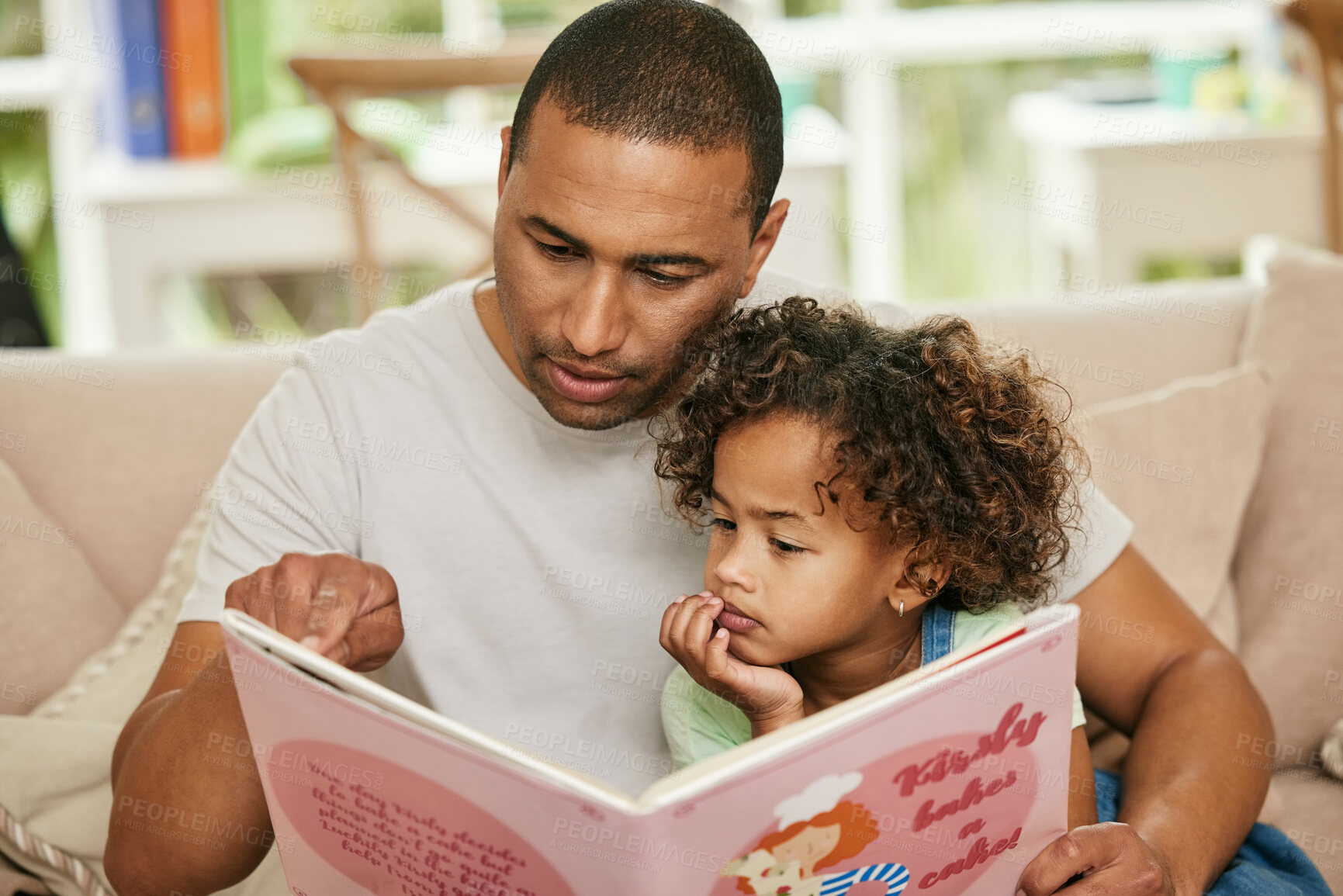 Buy stock photo Father, girl child and reading book on sofa for family bonding, learning and development in lounge. Dad, kid and together in home for storytelling with fairytale, parent teaching and childhood growth