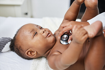 Buy stock photo Doctor, hands and stethoscope for heartbeat in clinic, sick and cold or monitor pulse for healthcare. Pediatrician, child and tool to check for heart rate or consulting, girl and infant for test