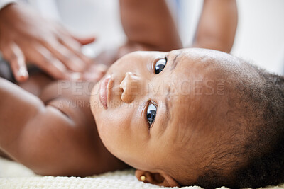 Buy stock photo Shot of a little baby getting a checkup by a doctor