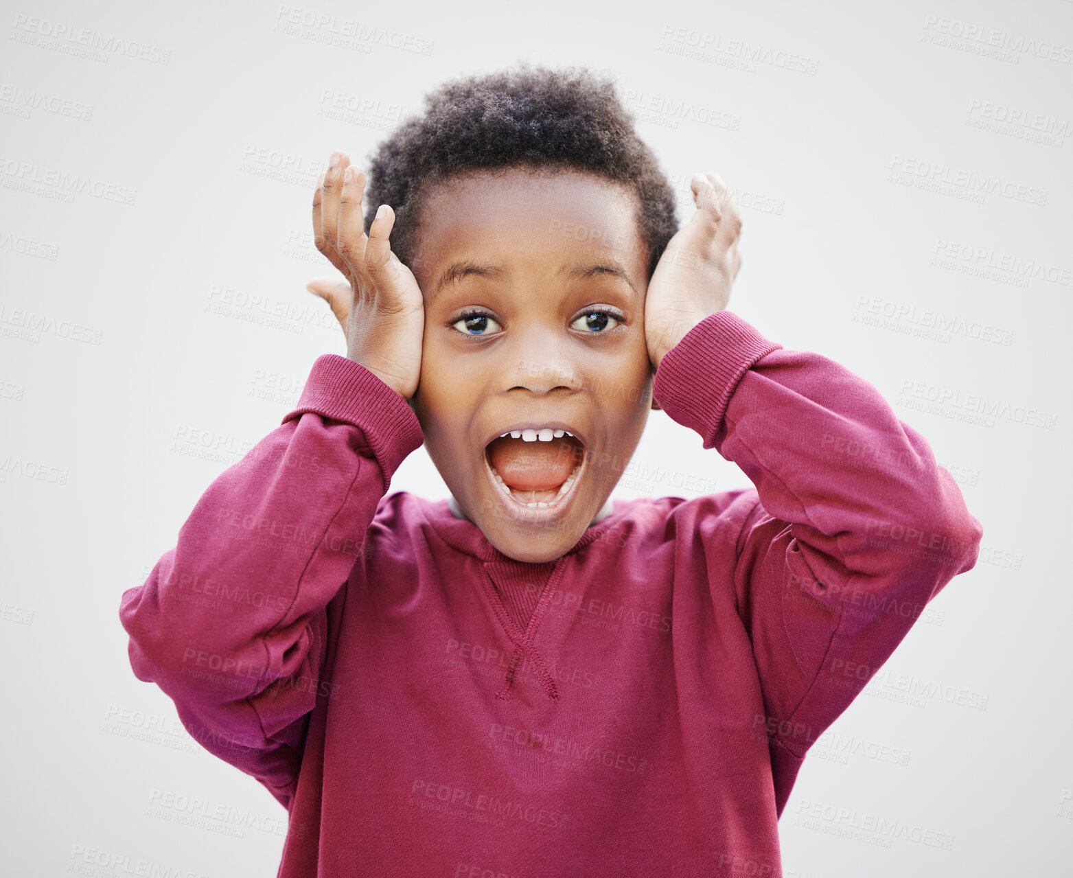 Buy stock photo Shot of an adorable little boy standing against a white background