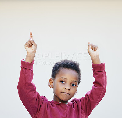 Buy stock photo Shot of an adorable little boy standing against a white background