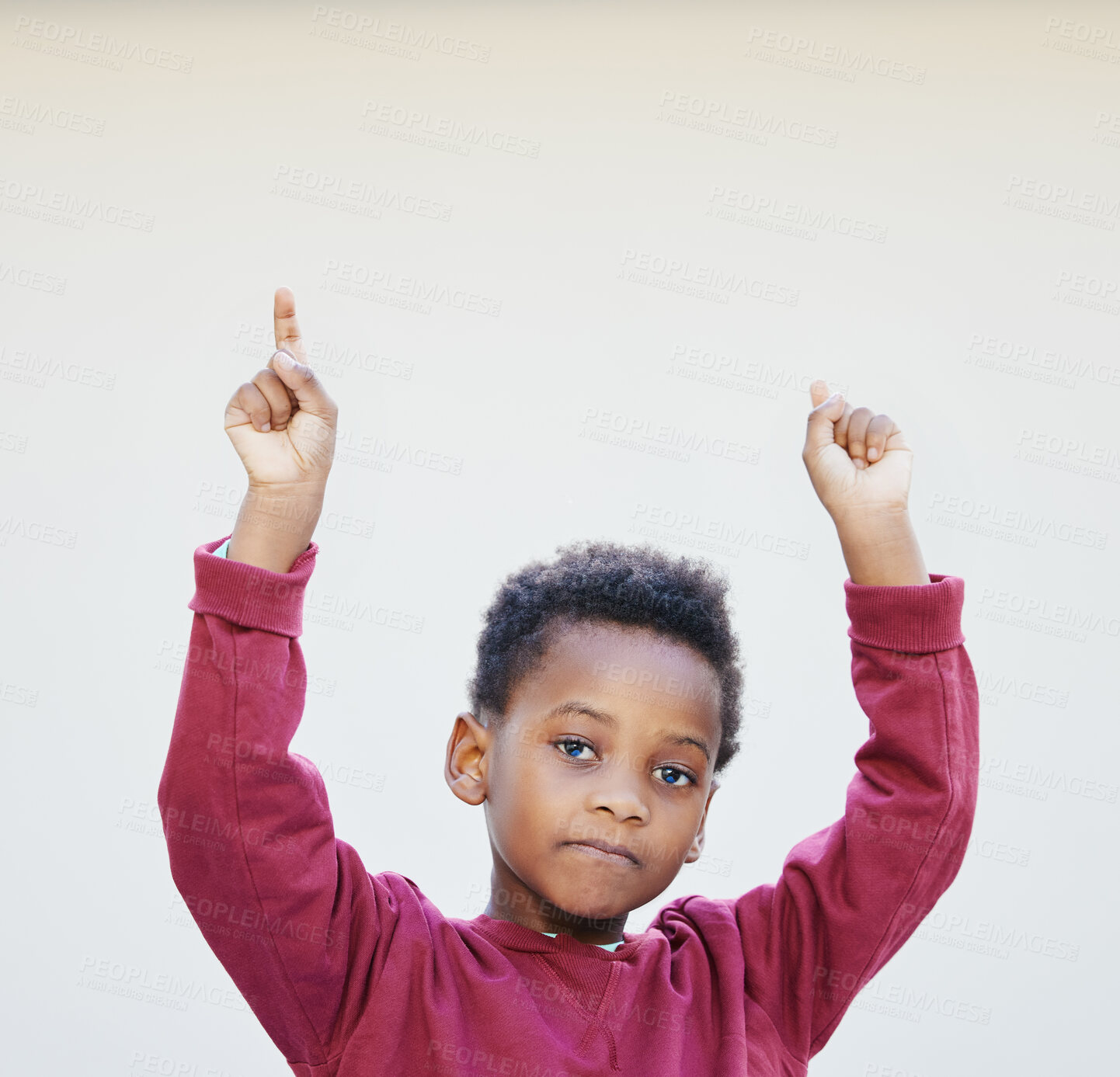 Buy stock photo Portrait, pointing and black boy in studio, confident and mockup space for little kid and promotion. Youth, adorable and cute face of child, white background and advertising with finger and hands