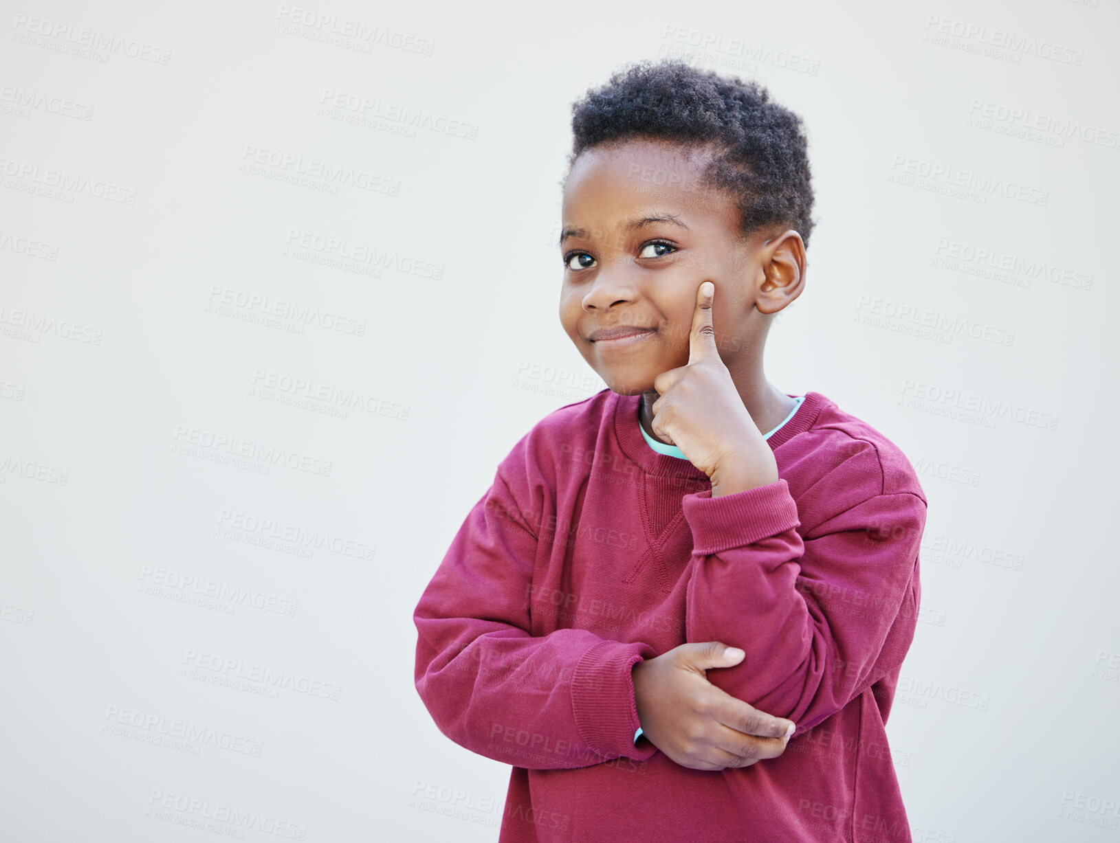 Buy stock photo Studio, thinking and black child with smile, preschool and smart boy with knowledge, idea and planning. White background, learning and education for kid, growth and development of brain in Nigeria