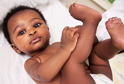 Buy stock photo Shot of a little baby at a checkup with a doctor at a clinic