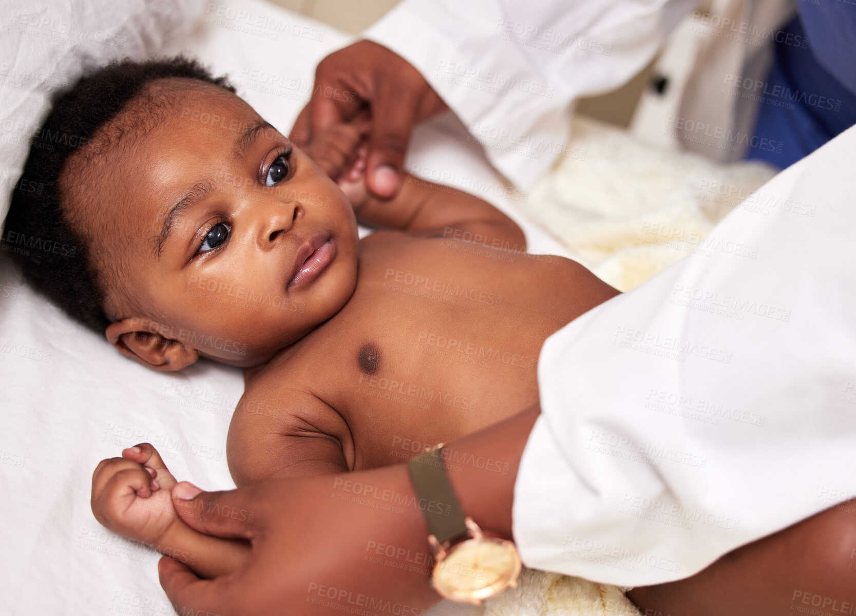 Buy stock photo African, little baby and bed for health checkup with doctor or paediatrician with infant or healthcare clinic and medical wellness. Child patient, consulting and expert with toddler in the hospital