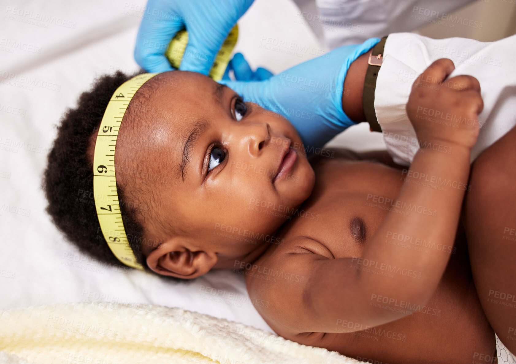 Buy stock photo Hospital, newborn and doctor with tape measure for medical support, examination or growth development. Head size, health and pediatrician with black baby for consultation, routine checkup or help